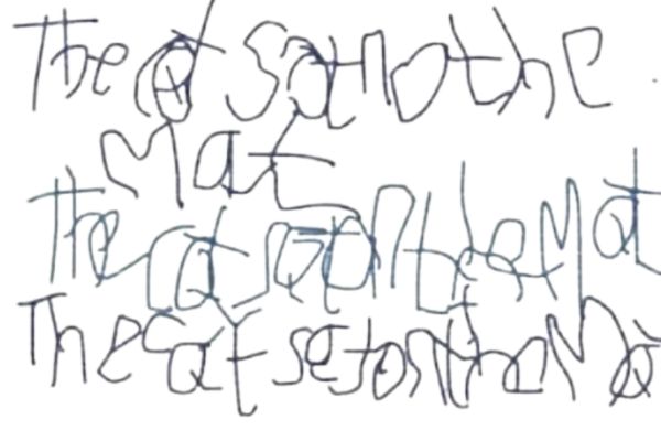 Child with dyspraxia writing